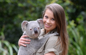 Bindi cuddling a koala