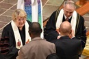 Bishop Charlene Kammerer and Bishop Paul Leeland serve communion during 2017 COB Memorial Service at First United Methodist Church in Waynesville, NC.  File photo by Maidstone Mulenga.
