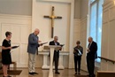 From left: Bishop Sally Dyck, Bishop Tom Bickerton and Bishop Bruce Ough present to Ecumenical Award to Rev. Dr. Robert Williams and his wife Renee during the worship service on September 15 at the UMC Building in Washington, D.C. (Photo courtesy of the Council of Bishops.)
