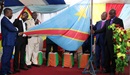Bishops and leaders of different religious denominations pray while holding the Congolese flag. The Integrity and Electoral Mediation Commission, chaired by United Methodist Bishop Gabriel Yemba Unda (second from right), organized a service to promote peace before, during and after the elections. Photo by Chadrack Londe, UMNS.