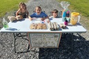 Arkansas United Methodist Etta Bolt (center) and her siblings organized a lemonade stand, raising $400 that they donated to UMCOR. Photo courtesy of Bolt family.