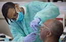 Student doctor Dionne Tompkins treats patient Reginald Hill during a clinic at the Meharry Medical College School of Dentistry in Nashville, Tenn. Photo by Mike DuBose, UMNS. 