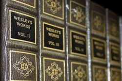 Multi-volume edition of Wesley's Works. Photo illustration by Kathryn Price, United Methodist Communications.