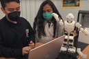 United Women in Faith helped Colegio Sara Alarcón school in Mexico City purchase five humanoid robots that students are learning to program. Photo courtesy of UWiF.