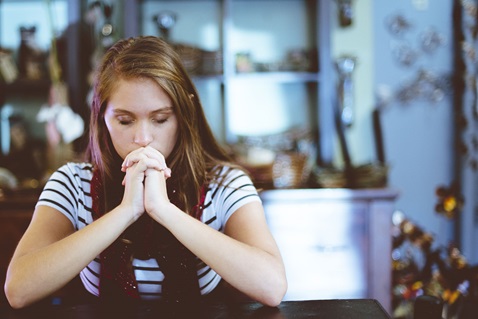 Prayer and scripture are sources of strength in the midst of uncertain times. Stock photo by Ben White, Christianpics.co.