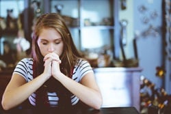 Prayer and scripture are sources of strength in the midst of uncertain times. Stock photo by Ben White, Christianpics.co.