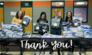 Teachers at Huron Middle share a photo of thanks for Riverview UMC's change of clothing ministry. Photo courtesy of Riverview UMC Facebook page.
