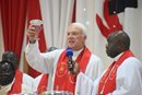 COB President Bishop Thomas J. Bickerton celebrates Holy Communion during the worship service in Lubumbashi, Democratic Republic of the Congo. (Photo courtesy of the Council of Bishops.)