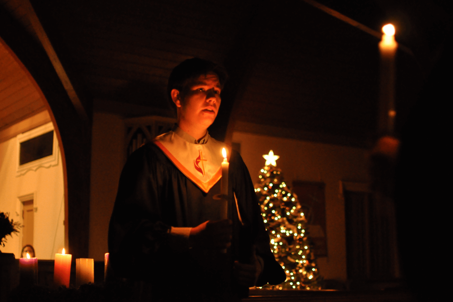 United Methodists gather for a Candlelight Service on Christmas Eve at St. Matthew UMC in Fort Worth, Texas. Photo by Angelia Sims of Angelia's Photography.